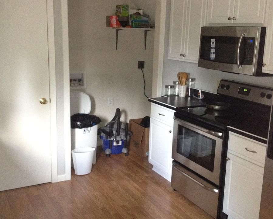 Utility closet with stacked washer/dryer (not shown)