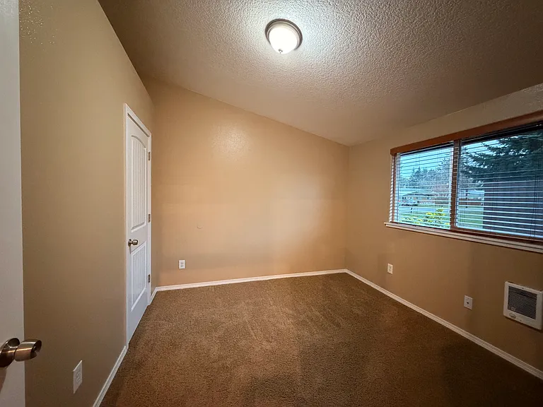 Bedroom with High Ceilings and Large Window!