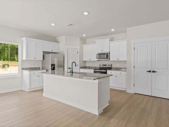 The kitchen has granite countertops