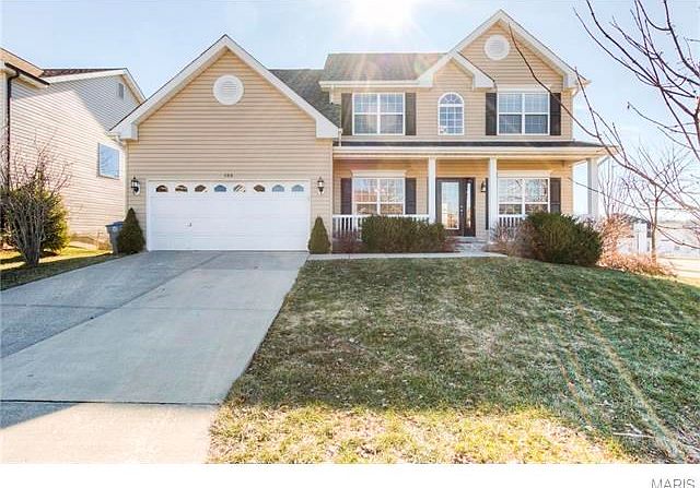 Large 2 story with 4 bedrooms, 2.5 baths, 2-car garage, walk out lower level on large .25 acre lot!  Covered front porch greets you!  Low maintenance exterior with vinyl siding and enclosed soffit/fascia.  Decorative crown molding over first floor windows