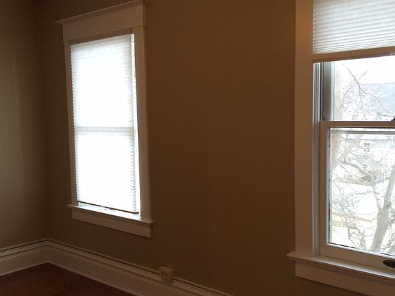 Front room, windows look out to street