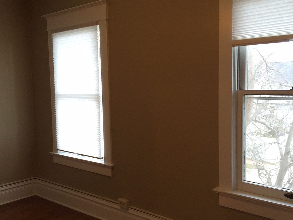 Front room, windows look out to street