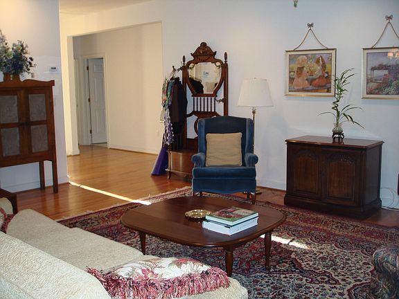 Living room looking into bedroom hallway