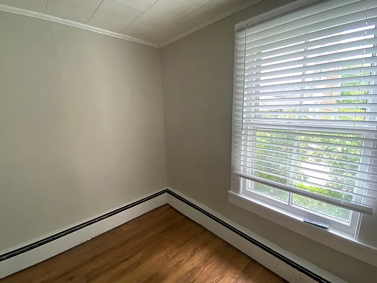 extra small room off from the bathroom.