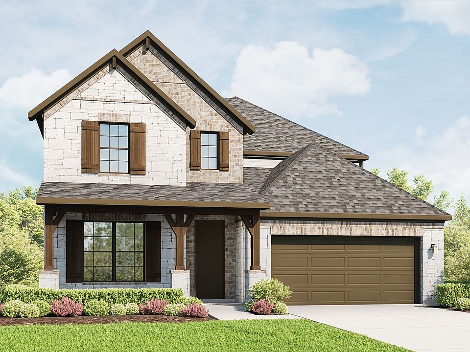 Exquisite gabled roof home with elegant stone facade and lush landscaping in prestigious Anthem.