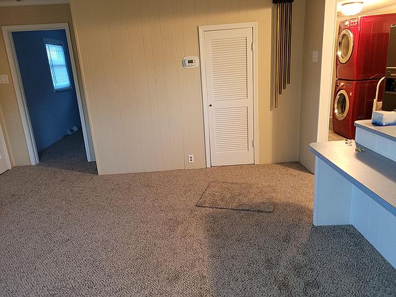 Living room, bedroom door on left closet door straight ahead