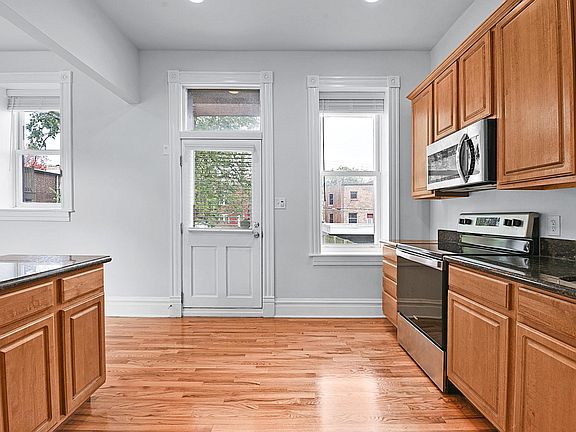 The Kitchen - granite countertops, luxury stainless steel appliance package, kitchen island great for eating or entertaining, Venetian blinds