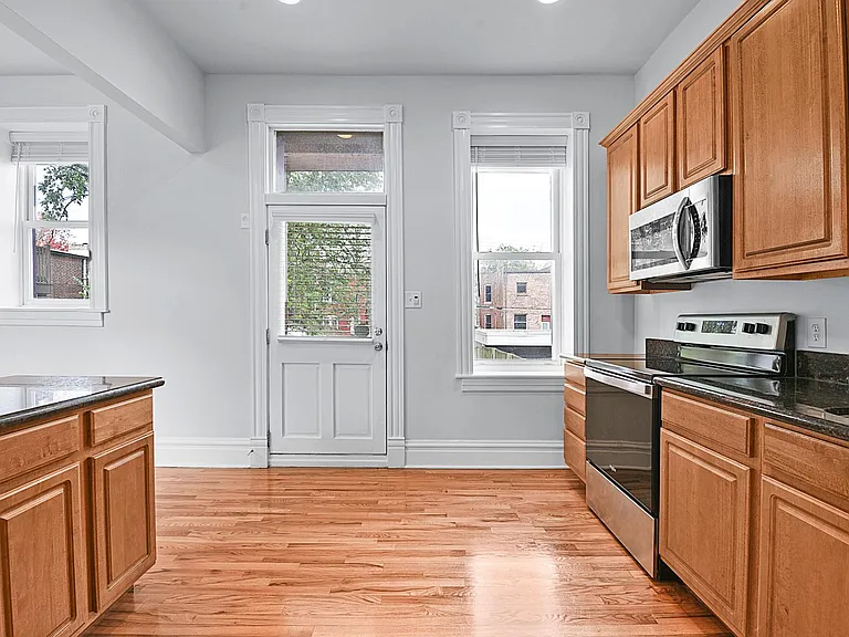 The Kitchen - granite countertops, luxury stainless steel appliance package, kitchen island great for eating or entertaining, Venetian blinds