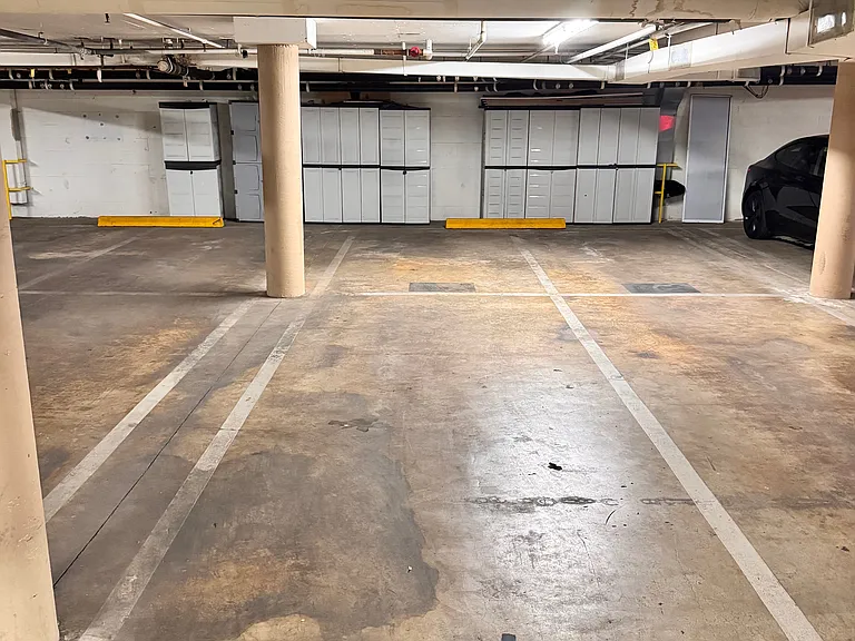 2 tandem parking spaces in gated garage
