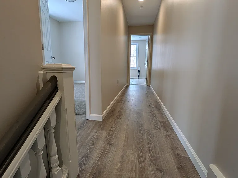 Hall leads to all bedrooms