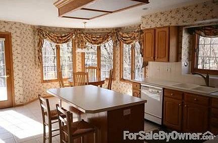 View of backyard from deck looking west