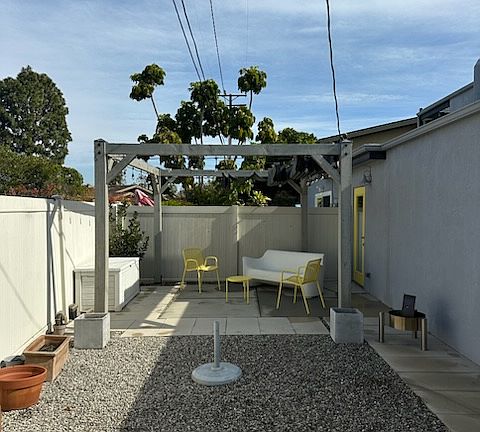 Back patio area with shade cover not visible.