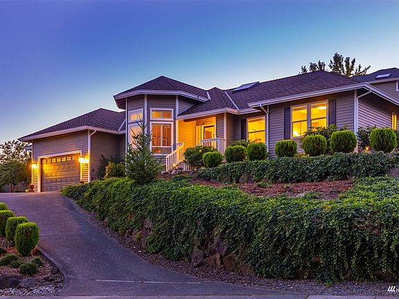 .36 acre low maintenance lot offers a private setting atop the street >