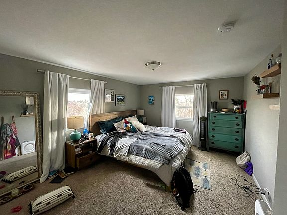 Bedroom 2 - large room, medium closet, with east/north facing windows