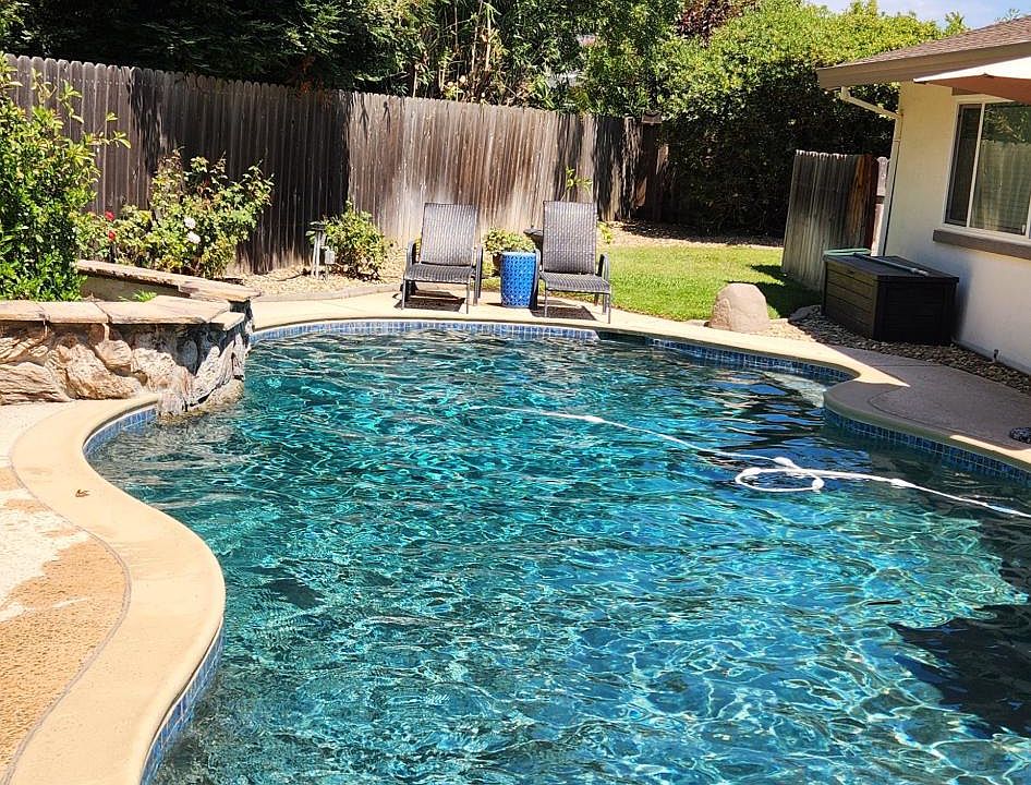 Newly refinished pebble tech pool with new high efficiency pump