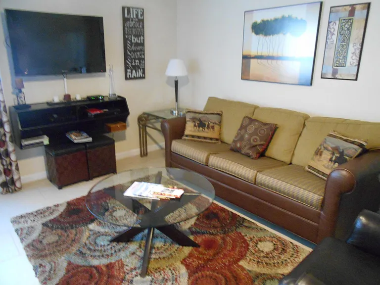Great Room with Leather Recliner, Sofa & two lounge chairs