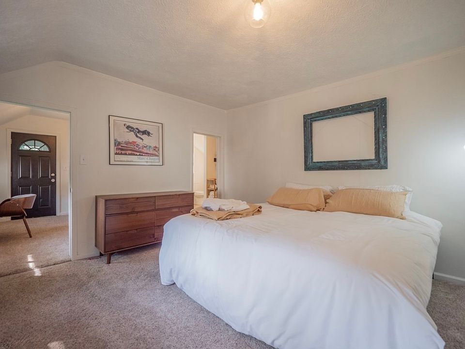 Spacious primary bedroom with en suite bath.