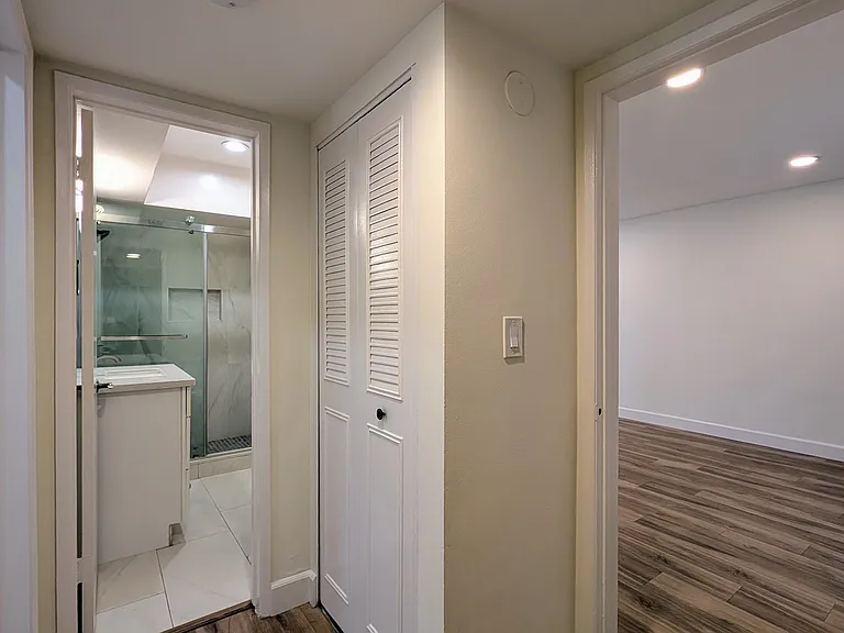 Hallway with storage cabinet