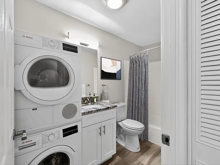 Elevate your lifestyle at Eagle Rock Apartments at West Hartford. This beautifully designed laundry room features modern appliances and stylish finishes, making chores a breeze. Don't miss outschedule your tour today!