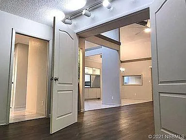 French doors lead to the den.