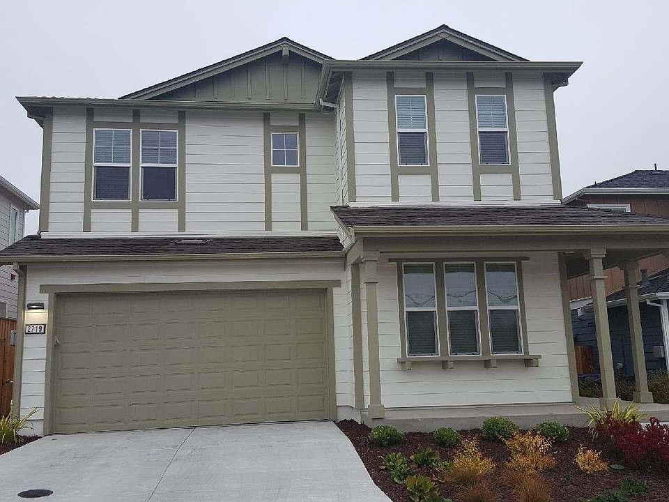Front view of the property with 2 car attached garage