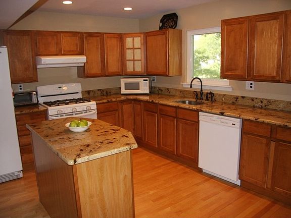 Newer Kitchen with Granite Countertops and Center Island
