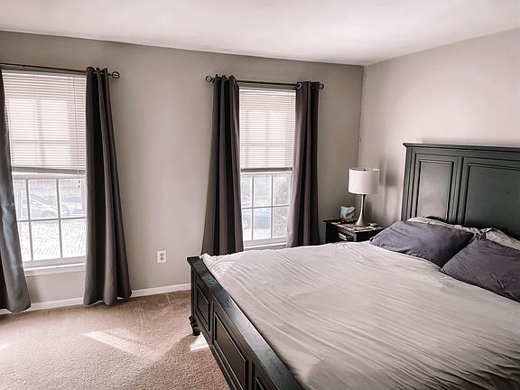 Plenty of light in the master bedroom. The room contains 2 closets