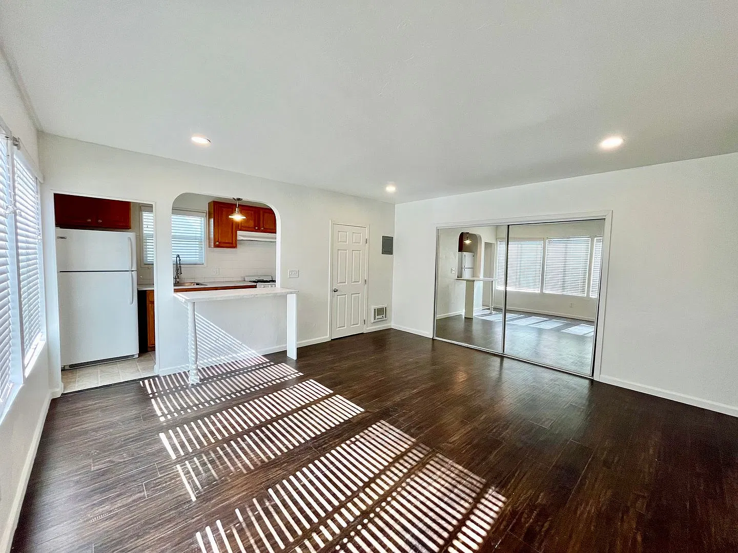 Spacious Studio with Archways, Kitchen Island, Onsite Laundry, and Natural Light! — Photo 2
