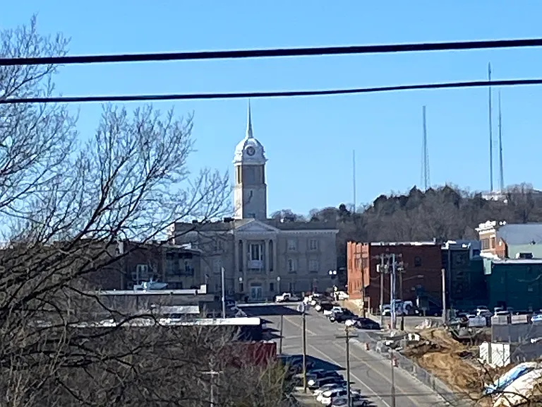 View of the courthouse from one of the bedrooms, living room and side porch