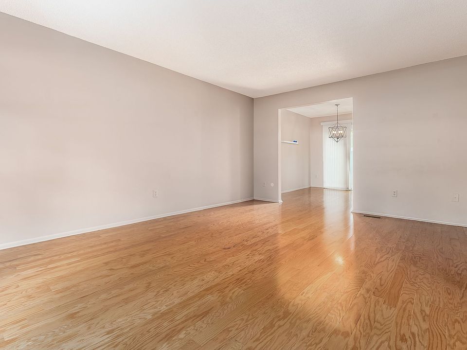 Living room view toward dining area
