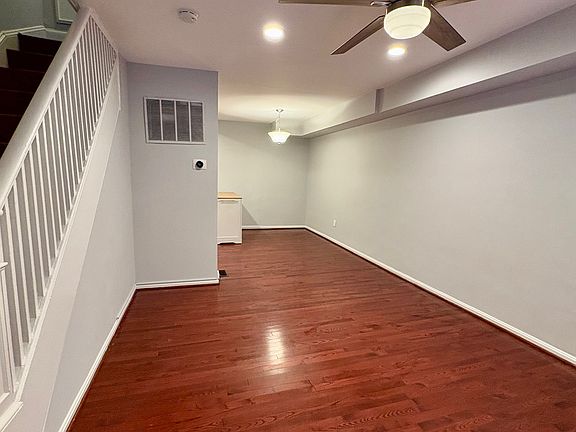 Open concept living room flows into dining area