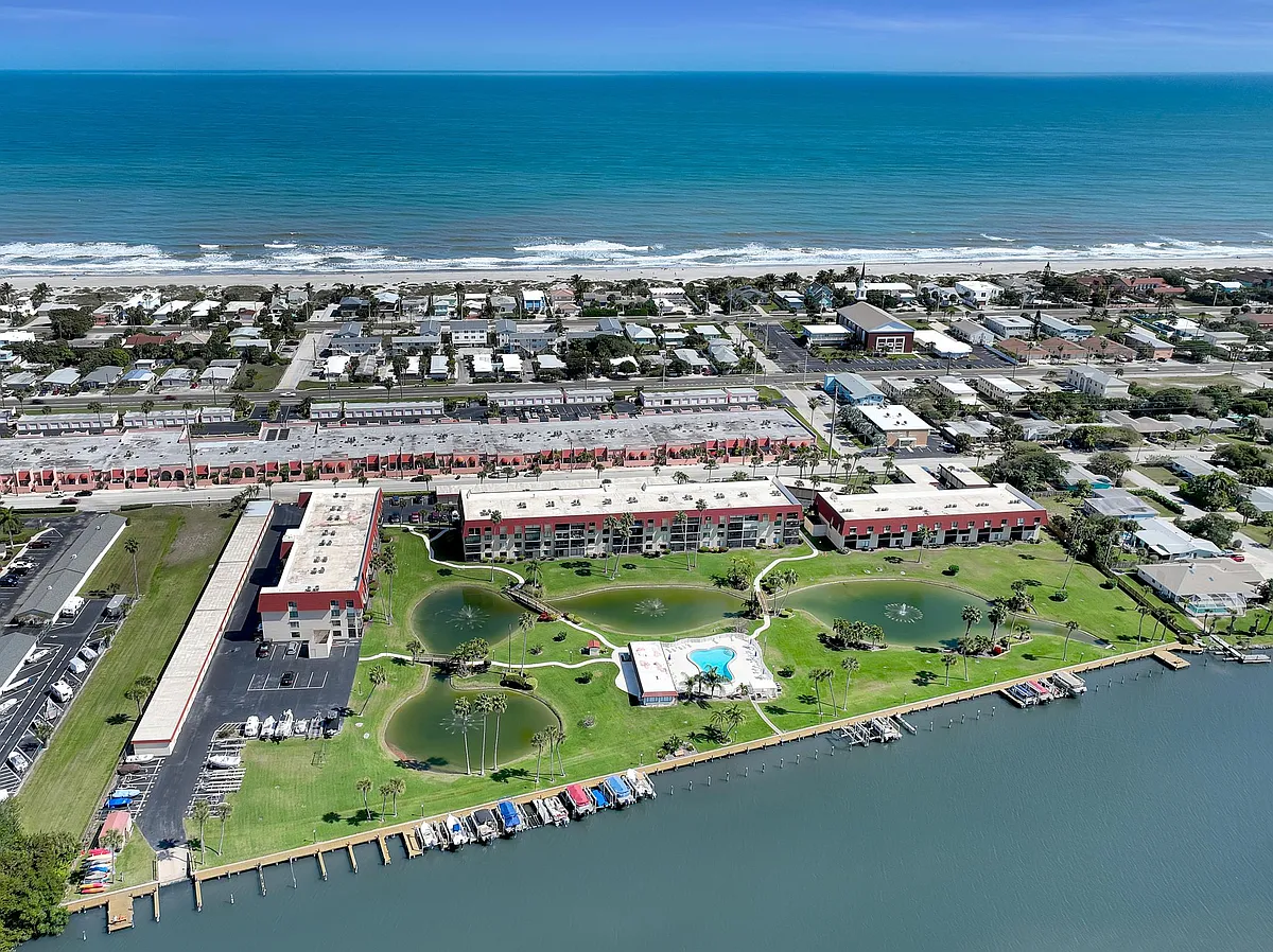Aerial of River Lakes Complex with Atlantic Ocean - 800 S Brevard Ave #216