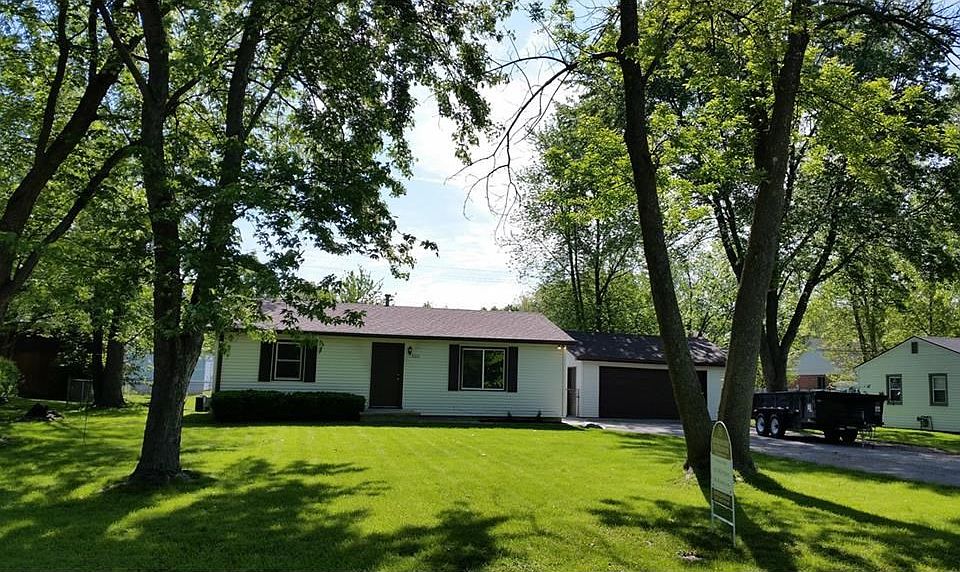Adorable bungalow on a picturesque lot. New Roof. New Windows. New Mechanicals.