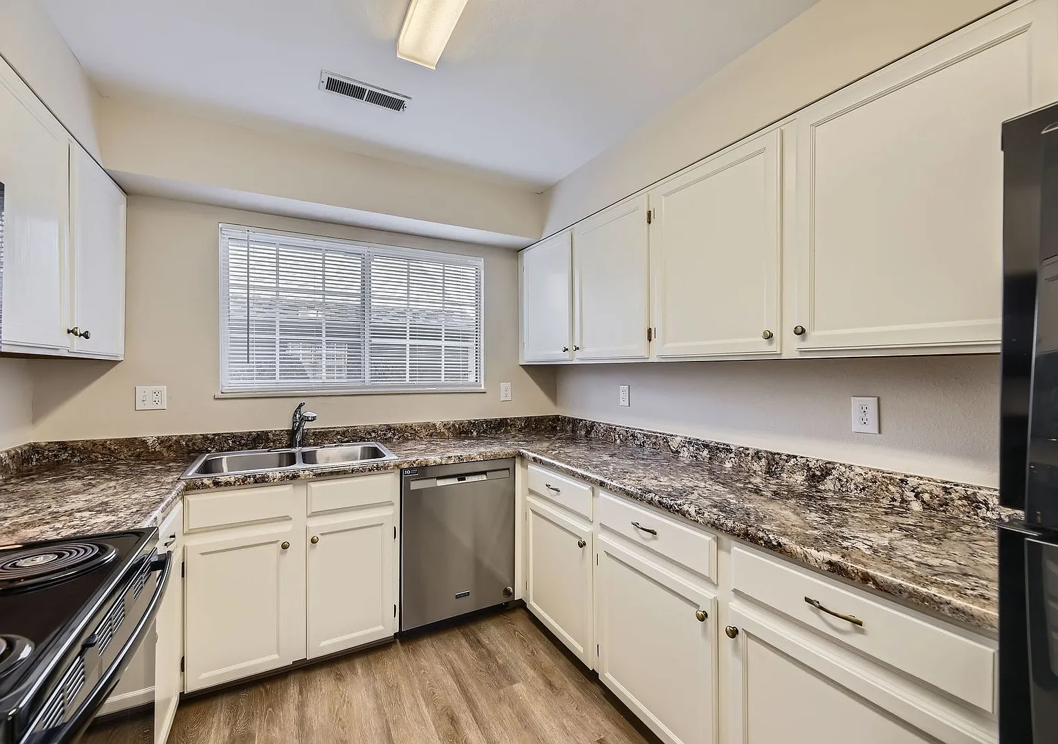 Evolve Real Estate: Updated Large Two Story with Basement 2 Bedroom 3 Bath with a Garage! — Photo 4