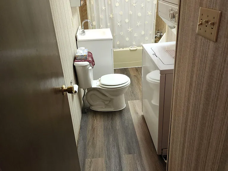 Bathroom with washer and dryer