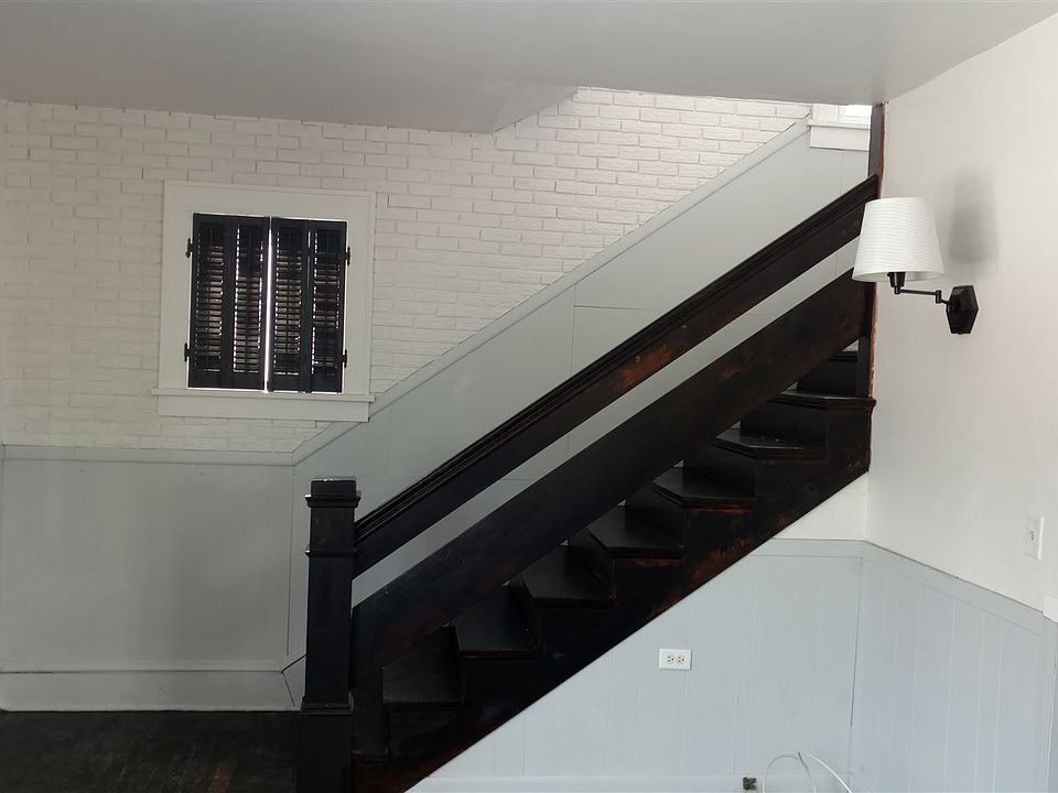 stairway to second level bedrooms and bath