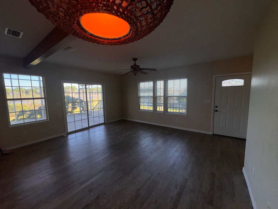 Living room looking east at Greenfield Creek