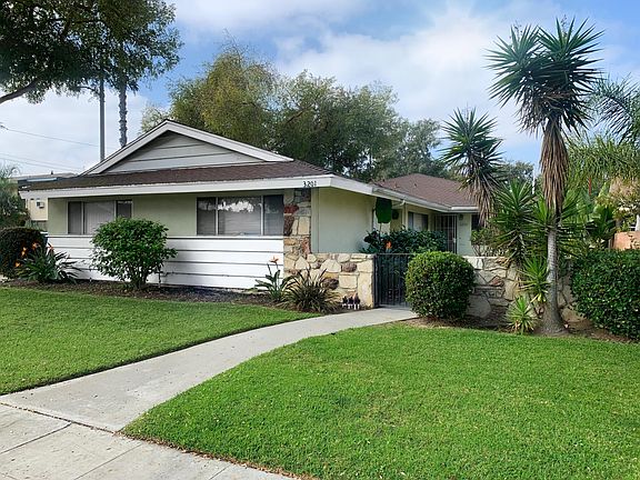 An outside view of the apartment duplex, on the corner of 32nd and Lemon Ave. Please view the video for a virtual tour of the unit.