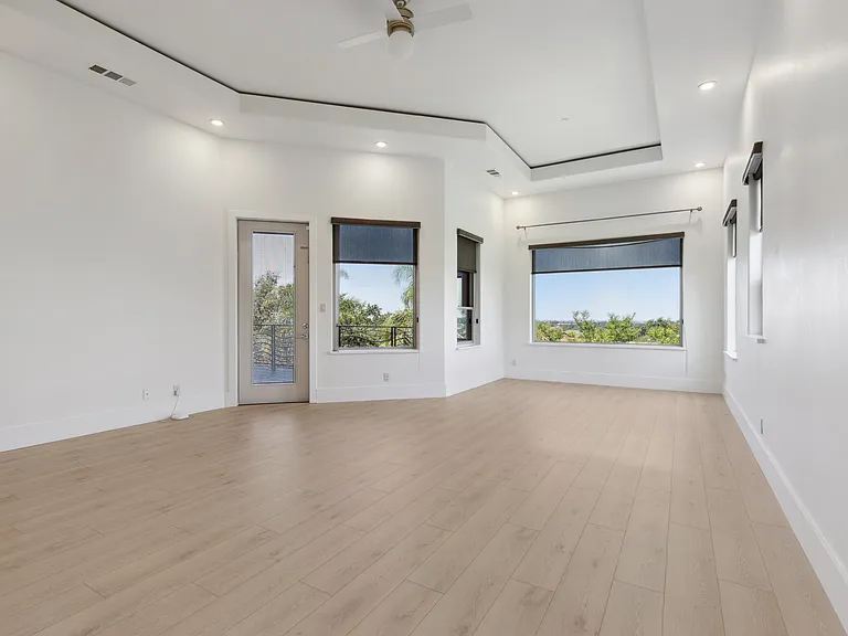 master bedroom with balcony access