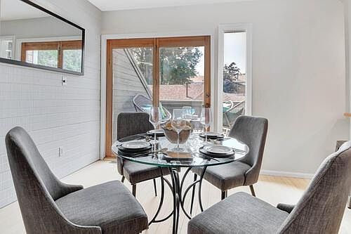 Open concept living room, dining room and kitchen.
