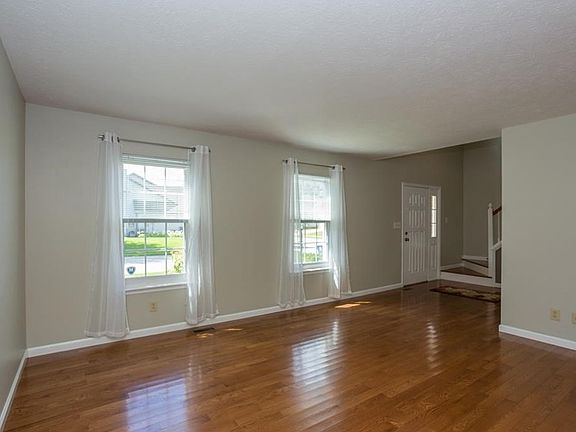 Living room has lots of light and a view of the front yard...By the way, CCS bus stops right in front of the house so your children can stay dry in inclimate weather!