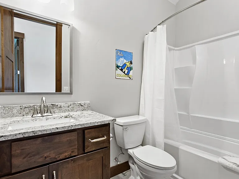 Third bathroom with tub
