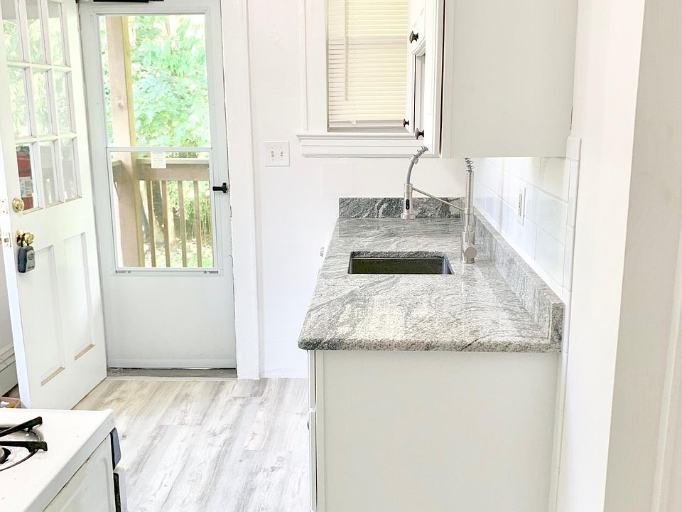 Kitchen with door to outdoor deck