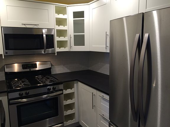 Kitchen appliances and shelving.