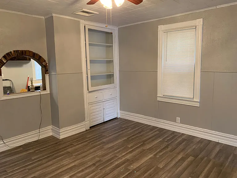 Built in cabinet and pass through into dining room