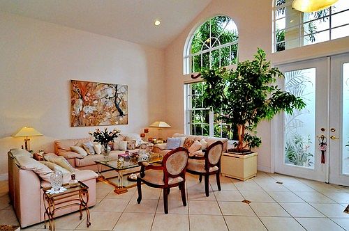 Double Door Entry and Arched Windows