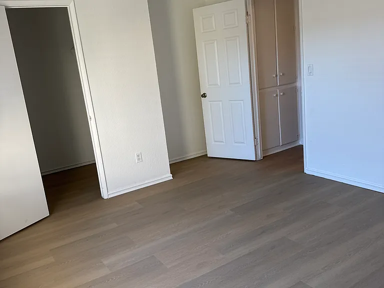 Master bedroom with walk in closet