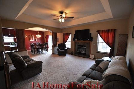 Unique hardwood columns frame entrance from Great Room into Dining Area