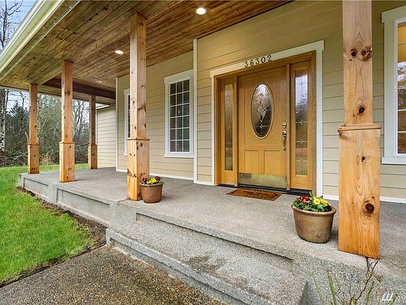 Welcome to this custom country home. Exceptional craftsmanship with attention to detail. C'mon in!