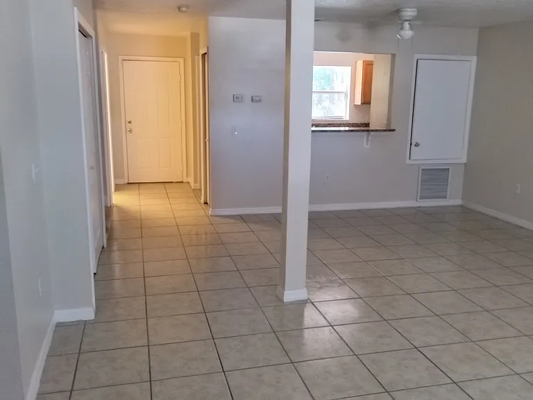 Large tile flooring throughout.